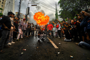 A 'fire breather' performs during Ashura, the 10th day of Muharram in the Islamic calendar. Muharram is the first month of the Islamic calendar & Ashura is the tenth day of the month of Muharram, which commemorates the martyrdom of Imam Hussain, the grandson of Prophet Muhammad (PBUH), during the battle of Karbala. It is part of Mourning for Shia Muslims and a day of fasting for Sunni Muslims that is observed all over the World.