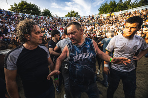 Aloitadores talk among themselves during the Rapa das Bestas celebration. “A Rapa Das Bestas" is an ancient Galician festival (dating back to the 15th century) held in the first days of July. It consists of capturing wild horses in the wild, leading them to a curro (enclosed enclosure) and cutting their manes to deworm and care for them. It is a ritual of strength and tradition that symbolizes the coexistence between man and nature celebrated primarily in Sabucedo.
