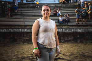An Aloitadora woman poses for a photo after finishing the first day of the Rapa das Bestas celebration. “A Rapa Das Bestas" is an ancient Galician festival (dating back to the 15th century) held in the first days of July. It consists of capturing wild horses in the wild, leading them to a curro (enclosed enclosure) and cutting their manes to deworm and care for them. It is a ritual of strength and tradition that symbolizes the coexistence between man and nature celebrated primarily in Sabucedo.