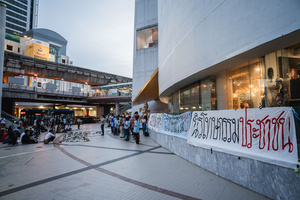 Protesters gather outside the Bangkok Art and Culture Centre during the “People’s Amnesty” vigil. People gathered outside Bangkok Art and Culture Centre for a candlelight vigil titled “Light Up Hope for the People’s Amnesty.” Organized ahead of a parliamentary debate on the 16 July 2025, the event featured personal testimonies, portraits of 50 political detainees, and a red rose display reading “Amnesty 112.” Participants called for the passage of a comprehensive amnesty bill covering cases under Section 112 of the Thai Criminal Code.