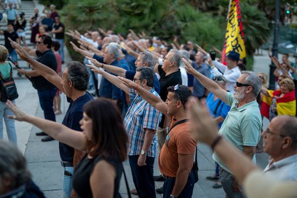 A group of people perform the fascist salute during a commemorative event in memory of those who fell in the first military operation of the Civil War in Madrid, by the Republican side on July 20, 1936, organized by the far-right organizations: Brotherhood of the Old Guard and Spanish Falange at the Monument to the Fallen in the Montaña Barracks of the Debod Temple in Madrid.