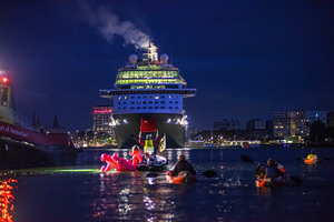 Extinction Rebellion climate activists in kayaks at pre-dawn attempt to block the path of Luxury Ocean liner the "Celebrity Eclipse" from docking at the Passages Terminal. A little before sunrise, climate activists from Extinction Rebellion, Netherlands attempted to block the path of Luxury Ocean liner the ‘Celebrity Eclipse’ from docking at the Passages Terminal in Amsterdam. The ‘Celebrity Eclipse’ is operated by Celebrity Cruises, a subsidiary of Royal Caribbean Group. The activist numbered 30 in all, with the majority in 2-person kayaks. ‘Cruise ships are floating environmental disasters. They should not be allowed in Dutch waters. We demand strict and binding national and international environmental standards and regulations, as well as strict enforcement and sanctions policy.