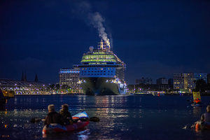 Extinction Rebellion climate activists in kayaks at pre-dawn attempt to block the path of Luxury Ocean liner the "Celebrity Eclipse" from docking at the Passages Terminal. A little before sunrise, climate activists from Extinction Rebellion, Netherlands attempted to block the path of Luxury Ocean liner the ‘Celebrity Eclipse’ from docking at the Passages Terminal in Amsterdam. The ‘Celebrity Eclipse’ is operated by Celebrity Cruises, a subsidiary of Royal Caribbean Group. The activist numbered 30 in all, with the majority in 2-person kayaks. ‘Cruise ships are floating environmental disasters. They should not be allowed in Dutch waters. We demand strict and binding national and international environmental standards and regulations, as well as strict enforcement and sanctions policy.