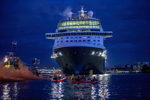 Extinction Rebellion climate activists in kayaks at pre-dawn attempt to block the path of Luxury Ocean liner the "Celebrity Eclipse" from docking at the Passages Terminal. A little before sunrise, climate activists from Extinction Rebellion, Netherlands attempted to block the path of Luxury Ocean liner the ‘Celebrity Eclipse’ from docking at the Passages Terminal in Amsterdam. The ‘Celebrity Eclipse’ is operated by Celebrity Cruises, a subsidiary of Royal Caribbean Group. The activist numbered 30 in all, with the majority in 2-person kayaks. ‘Cruise ships are floating environmental disasters. They should not be allowed in Dutch waters. We demand strict and binding national and international environmental standards and regulations, as well as strict enforcement and sanctions policy.
