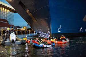 Extinction Rebellion climate activists in kayaks, attempt to block the path of Luxury Ocean liner the "Celebrity Eclipse" from docking at the Passages Terminal. A little before sunrise, climate activists from Extinction Rebellion, Netherlands attempted to block the path of Luxury Ocean liner the ‘Celebrity Eclipse’ from docking at the Passages Terminal in Amsterdam. The ‘Celebrity Eclipse’ is operated by Celebrity Cruises, a subsidiary of Royal Caribbean Group. The activist numbered 30 in all, with the majority in 2-person kayaks. ‘Cruise ships are floating environmental disasters. They should not be allowed in Dutch waters. We demand strict and binding national and international environmental standards and regulations, as well as strict enforcement and sanctions policy.
