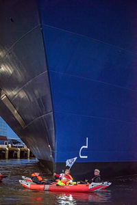 Extinction Rebellion climate activists in kayaks, attempt to block the path of Luxury Ocean liner the "Celebrity Eclipse" from docking at the Passages Terminal. A little before sunrise, climate activists from Extinction Rebellion, Netherlands attempted to block the path of Luxury Ocean liner the ‘Celebrity Eclipse’ from docking at the Passages Terminal in Amsterdam. The ‘Celebrity Eclipse’ is operated by Celebrity Cruises, a subsidiary of Royal Caribbean Group. The activist numbered 30 in all, with the majority in 2-person kayaks. ‘Cruise ships are floating environmental disasters. They should not be allowed in Dutch waters. We demand strict and binding national and international environmental standards and regulations, as well as strict enforcement and sanctions policy.