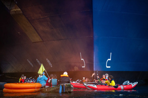 Extinction Rebellion climate activists in kayaks, attempt to block the path of Luxury Ocean liner the "Celebrity Eclipse" from docking at the Passages Terminal. A little before sunrise, climate activists from Extinction Rebellion, Netherlands attempted to block the path of Luxury Ocean liner the ‘Celebrity Eclipse’ from docking at the Passages Terminal in Amsterdam. The ‘Celebrity Eclipse’ is operated by Celebrity Cruises, a subsidiary of Royal Caribbean Group. The activist numbered 30 in all, with the majority in 2-person kayaks. ‘Cruise ships are floating environmental disasters. They should not be allowed in Dutch waters. We demand strict and binding national and international environmental standards and regulations, as well as strict enforcement and sanctions policy.