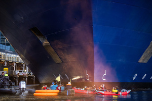 Extinction Rebellion climate activists in kayaks, attempt to block the path of Luxury Ocean liner the "Celebrity Eclipse" from docking at the Passages Terminal. A little before sunrise, climate activists from Extinction Rebellion, Netherlands attempted to block the path of Luxury Ocean liner the ‘Celebrity Eclipse’ from docking at the Passages Terminal in Amsterdam. The ‘Celebrity Eclipse’ is operated by Celebrity Cruises, a subsidiary of Royal Caribbean Group. The activist numbered 30 in all, with the majority in 2-person kayaks. ‘Cruise ships are floating environmental disasters. They should not be allowed in Dutch waters. We demand strict and binding national and international environmental standards and regulations, as well as strict enforcement and sanctions policy.