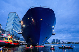 Extinction Rebellion climate activists in kayaks, attempt to block the path of Luxury Ocean liner the "Celebrity Eclipse" from docking at the Passages Terminal. A little before sunrise, climate activists from Extinction Rebellion, Netherlands attempted to block the path of Luxury Ocean liner the ‘Celebrity Eclipse’ from docking at the Passages Terminal in Amsterdam. The ‘Celebrity Eclipse’ is operated by Celebrity Cruises, a subsidiary of Royal Caribbean Group. The activists numbered 30 in all, with the majority in 2-person kayaks stating that "Cruise ships are floating environmental disasters. They should not be allowed in Dutch waters. We demand strict and binding national and international environmental standards and regulations, as well as strict enforcement and sanctions policy."