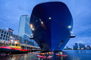 Extinction Rebellion climate activists in kayaks, attempt to block the path of Luxury Ocean liner the "Celebrity Eclipse" from docking at the Passages Terminal. A little before sunrise, climate activists from Extinction Rebellion, Netherlands attempted to block the path of Luxury Ocean liner the ‘Celebrity Eclipse’ from docking at the Passages Terminal in Amsterdam. The ‘Celebrity Eclipse’ is operated by Celebrity Cruises, a subsidiary of Royal Caribbean Group. The activist numbered 30 in all, with the majority in 2-person kayaks. ‘Cruise ships are floating environmental disasters. They should not be allowed in Dutch waters. We demand strict and binding national and international environmental standards and regulations, as well as strict enforcement and sanctions policy.