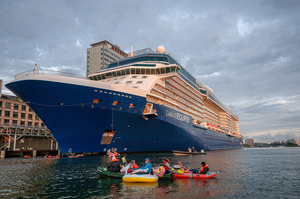 Extinction Rebellion climate activist in kayaks, attempt to block the path of Luxury Ocean liner the "Celebrity Eclipse" from docking at the Passages Terminal. A little before sunrise, climate activists from Extinction Rebellion, Netherlands attempted to block the path of Luxury Ocean liner the ‘Celebrity Eclipse’ from docking at the Passages Terminal in Amsterdam. The ‘Celebrity Eclipse’ is operated by Celebrity Cruises, a subsidiary of Royal Caribbean Group. The activists numbered 30 in all, with the majority in 2-person kayaks stating that "Cruise ships are floating environmental disasters. They should not be allowed in Dutch waters. We demand strict and binding national and international environmental standards and regulations, as well as strict enforcement and sanctions policy."