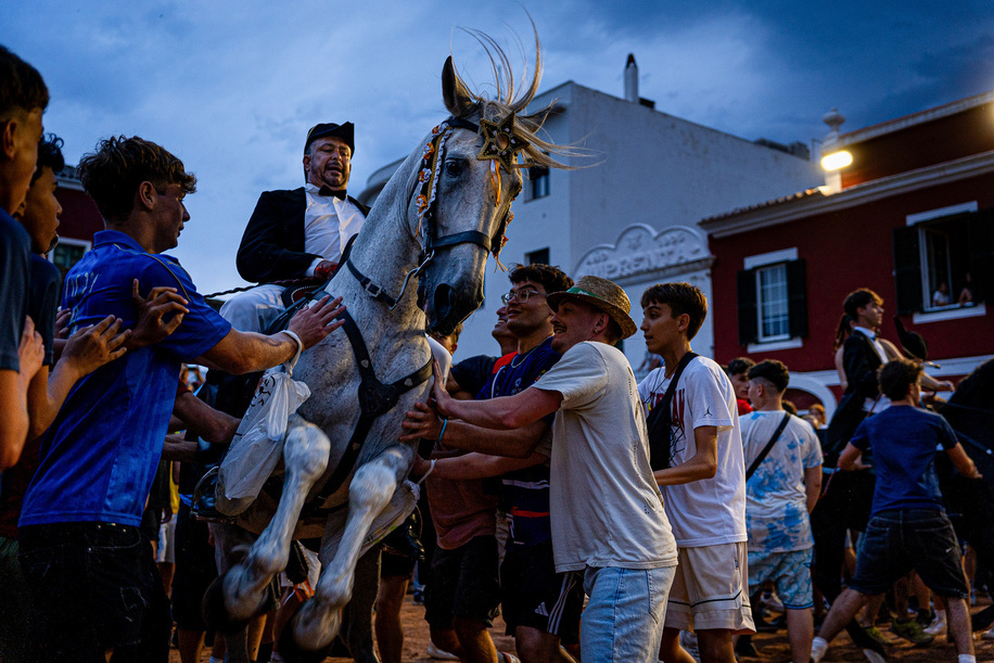 A horse rider in traditional dress, known as 