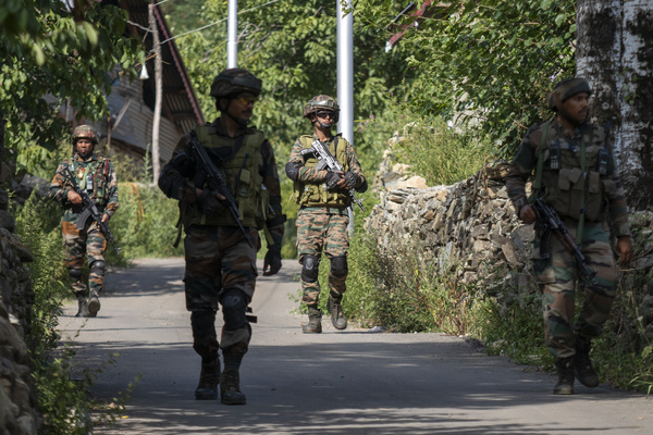 Indian army soldiers seen patrolling near the site of a gunbattle in a mountainous area of capital city Srinagar. An operation is underway between the army and militants in the Lidwas area of Srinagar's Harwan, where three suspected militants have been killed, according to local news reports citing military officials.