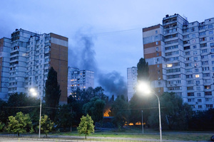 Smoke rises in a residential neighborhood following the Russian missile attack. On July 31, 2025, a massive Russian missile and drone attack on Kyiv left at least 16 people dead, including two children, and caused widespread destruction. Ukrainian forces intercepted most of the 309 drones and eight cruise missiles, but some struck residential areas, collapsing a section of a nine-story building. Over 100 buildings were damaged across 27 locations, including schools, hospitals, and homes.
