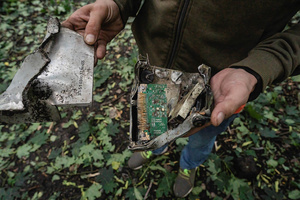 Local resident showing a piece of a missile following the Russian missile attack. On July 31, 2025, a massive Russian missile and drone attack on Kyiv left at least 16 people dead, including two children, and caused widespread destruction. Ukrainian forces intercepted most of the 309 drones and eight cruise missiles, but some struck residential areas, collapsing a section of a nine-story building. Over 100 buildings were damaged across 27 locations, including schools, hospitals, and homes.