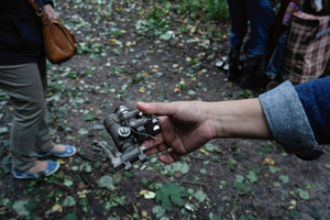 Local resident showing a piece of a missile following the Russian missile attack. On July 31, 2025, a massive Russian missile and drone attack on Kyiv left at least 16 people dead, including two children, and caused widespread destruction. Ukrainian forces intercepted most of the 309 drones and eight cruise missiles, but some struck residential areas, collapsing a section of a nine-story building. Over 100 buildings were damaged across 27 locations, including schools, hospitals, and homes.