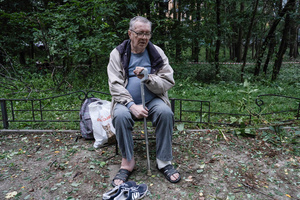 A resident sits outside their damaged home following the Russian missile attack. On July 31, 2025, a massive Russian missile and drone attack on Kyiv left at least 16 people dead, including two children, and caused widespread destruction. Ukrainian forces intercepted most of the 309 drones and eight cruise missiles, but some struck residential areas, collapsing a section of a nine-story building. Over 100 buildings were damaged across 27 locations, including schools, hospitals, and homes.