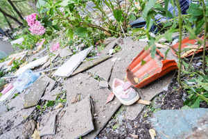 Damaged belongings are scattered following the Russian missile attack. On July 31, 2025, a massive Russian missile and drone attack on Kyiv left at least 16 people dead, including two children, and caused widespread destruction. Ukrainian forces intercepted most of the 309 drones and eight cruise missiles, but some struck residential areas, collapsing a section of a nine-story building. Over 100 buildings were damaged across 27 locations, including schools, hospitals, and homes.