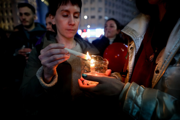 A protester holds a lit candle seen during the candlelight march in defense of the Garrahan Hospital. Members and patients of Garrahan Hospital marched demanding better wages and improved working conditions.