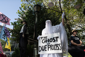Demonstrators of the group "Extinction Rebellion" protest outside of the Immigration Court. Demonstrators of the group "Extinction Rebellion" protest outside of the Immigration Court at 26 Federal Plaza against ICE detainments and inhumane holding conditions.