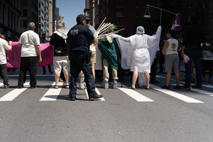 New York Police Department prepares for mass arrests. Demonstrators of the group "Extinction Rebellion" protest outside of the Immigration Court at 26 Federal Plaza against ICE detainments and inhumane holding conditions.
