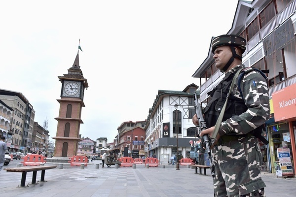 An Indian paramilitary trooper stands alert ahead of the India's 79th Independence day.