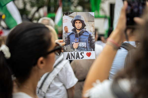 A woman holds a placard with the picture of Anas al-Sharif, Al Jazeera's journalist that was killed by Israeli army at the Gaza Strip during the demonstration. Dozens of people demonstrated to denounce the killing of Al Jazeera's journalists by Israeli army at the Gaza Strip and to call for an end to Israel's genocide of the Palestinian people. There have been repeated demonstrations calling for an end to the Israeli invasion.