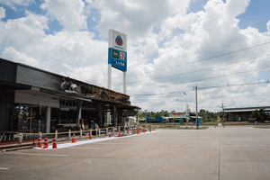 The damaged 7-Eleven at a PTT station in Kantharalak, weeks after a rocket strike during the Thai-Cambodian border clash killed seven people and injured one. Three weeks after the Cambodian border clash, Kantharalak still bears the scars, including the July 24 rocket strike on a PTT station that killed eight civilians and injured several others. The station remains closed, leaving more than 50 employees in limbo as compensation issues remain unresolved.