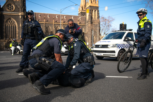 Police arrest transgender rights activists after they staged a counter-protest against an anti-trans "Women Will Speak" rally.
