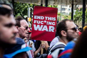 (EDITORS NOTE: Image contains profanity) A protester holds an anti-war sign during a demonstration. Demonstrators call on Israeli Prime Minister Benjamin Netanyahu to end the war in Gaza and to release all 50 Israeli hostages held by Hamas since October 7, 2023. On what was the biggest day of national mobilization, hundreds of thousands of people poured into the streets around the country to demand a Hostage release deal and an end to the war in Gaza.