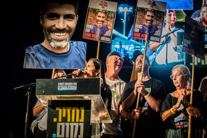 The family of Israeli hostage Tamir Adar speaks to protesters during a demonstration. Demonstrators call on Israeli Prime Minister Benjamin Netanyahu to end the war in Gaza and to release all 50 Israeli hostages held by Hamas since October 7, 2023. On what was the biggest day of national mobilization, hundreds of thousands of people poured into the streets around the country to demand a Hostage release deal and an end to the war in Gaza.