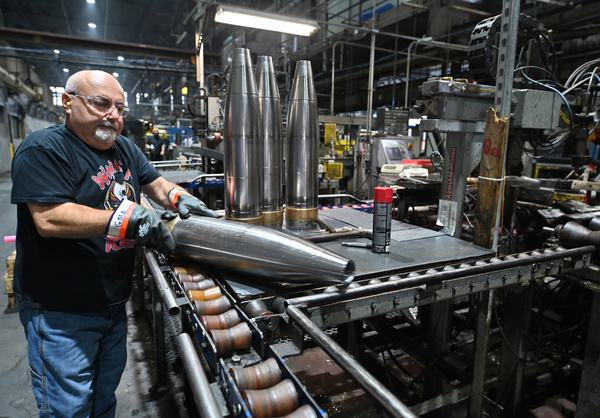 An employee moves a shell along the line at General Dynamics. U.S. Senator. Dave McCormick and U.S. Rep. Rob Bresnahan toured the General Dynamics’ plant in Scranton. The tour showed the process of creating shells from metal billets. The senator was there to learn more about local contributions to rebuilding the nation’s military and preparedness. The plant produces 155 mm shells that are used by Ukraine to defend against Russia.