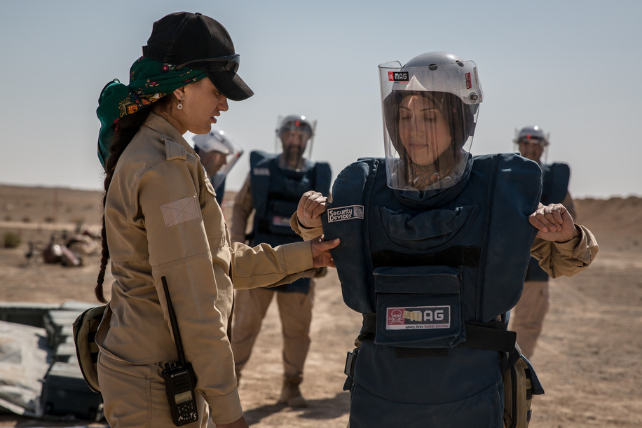 Deminers from the Mines Advisory Group put on protective gear before they start work in northern Syria. Following the fall of the Assad regime in December 2024, Syria has become one of the most heavily mined countries, with explosive devices posing a deadly threat to returning civilians. International demining efforts are underway to safely remove these remnants of war, a critical task to enable resettlement, rebuild infrastructure, and restore normal life.