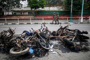 Nepal Army patrol the streets after the Gen Z protests in Kathmandu, Nepal, on Wednesday, September 10, 2025, the third day of an army-imposed curfew. The demonstrations, sparked by anger over corruption, the social media ban, and the killing of more than 19 youths, led to the resignation of Prime Minister K.P. Sharma Oli. The country remains under army control amid escalating unrest.