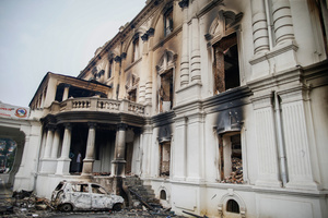 Burnt vehicles and buildings are seen inside the Department of Roads following the Gen Z protests in Kathmandu, Nepal, on Wednesday, September 10, 2025, the third day of an army-imposed curfew. The demonstrations, fueled by anger over corruption, the social media ban, and the killing of more than 19 youths, forced Prime Minister K.P. Sharma Oli to resign. The country remains under army control amid ongoing unrest.