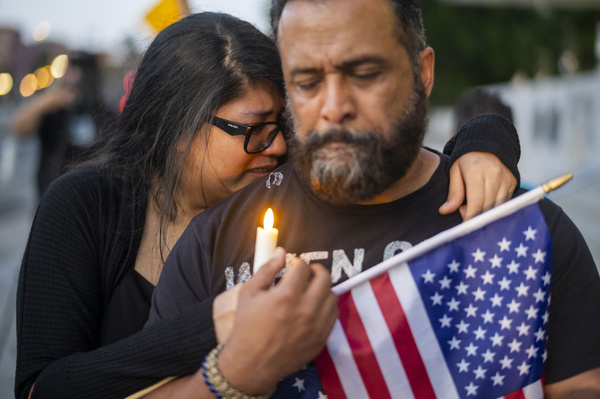 People attend a vigil for Charlie Kirk in Los Angeles on Sept. 11, 2025. Kirk was fatally shot a day earlier while speaking at Utah Valley University in Orem, Utah.