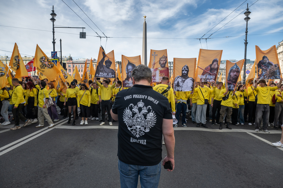 Members of the society “Double-Headed Eagle” take part in a religious procession along Nevsky Prospect in honor of the Day of the Translation of the Relics of Saint Blessed Prince Alexander Nevsky.