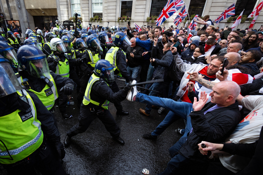 Unite The Kingdom supporters clash with police on Whitehall. Scuffles broke out after Tommy Robinson's Unite The Kingdom march finished and police decided to move attendees away from the rally. A counter-demonstration was also organised by Stand Up To Racism, which saw 16000 police officers deployed to keep the peace. Up to 150,000 people are believed to have joined the march.