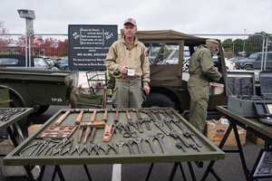 The showcase booth of WWII US tank mechanics reenactors. The Tank Museum's Tiger Day is a biannually event at Bovington camp showcasing German Tiger 131, the only operational Tiger I tank in the world, it also features other World War II-era tanks including M4A2E8 Sherman "Fury", M3 Grant and the British Churchill tank. The event included a reenactment of the Battle of "Capture the Tiger", demonstrating how the Tiger 131 was captured on 24th April 1943 in Tunisia by 42nd Battalion Royal Armored Corps and 2nd Sherwood Foresters.