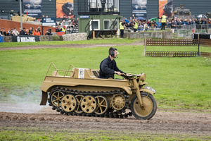 The showcase of a German Kettenkrad in the arena. The Tank Museum's Tiger Day is a biannually event at Bovington camp showcasing German Tiger 131, the only operational Tiger I tank in the world, it also features other World War II-era tanks including M4A2E8 Sherman "Fury", M3 Grant and the British Churchill tank. The event included a reenactment of the Battle of "Capture the Tiger", demonstrating how the Tiger 131 was captured on 24th April 1943 in Tunisia by 42nd Battalion Royal Armored Corps and 2nd Sherwood Foresters.