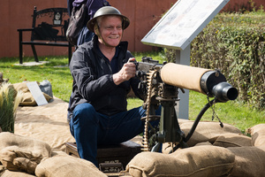 A spectator is seen holding a replica of Vickers Machine Gun. The Tank Museum's Tiger Day is a biannually event at Bovington camp showcasing German Tiger 131, the only operational Tiger I tank in the world, it also features other World War II-era tanks including M4A2E8 Sherman "Fury", M3 Grant and the British Churchill tank. The event included a reenactment of the Battle of "Capture the Tiger", demonstrating how the Tiger 131 was captured on 24th April 1943 in Tunisia by 42nd Battalion Royal Armored Corps and 2nd Sherwood Foresters.