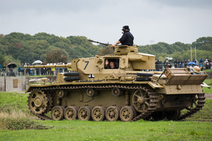 The running Panzer III tank seen during the showcase in the arena. The Tank Museum's Tiger Day is a biannually event at Bovington camp showcasing German Tiger 131, the only operational Tiger I tank in the world, it also features other World War II-era tanks including M4A2E8 Sherman "Fury", M3 Grant and the British Churchill tank. The event included a reenactment of the Battle of "Capture the Tiger", demonstrating how the Tiger 131 was captured on 24th April 1943 in Tunisia by 42nd Battalion Royal Armored Corps and 2nd Sherwood Foresters.