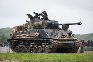 The showcase of the M4A2E8 Sherman "Fury" tank, which was used as the main character tank in the movie "Fury". The Tank Museum's Tiger Day is a biannually event at Bovington camp showcasing German Tiger 131, the only operational Tiger I tank in the world, it also features other World War II-era tanks including M4A2E8 Sherman "Fury", M3 Grant and the British Churchill tank. The event included a reenactment of the Battle of "Capture the Tiger", demonstrating how the Tiger 131 was captured on 24th April 1943 in Tunisia by 42nd Battalion Royal Armored Corps and 2nd Sherwood Foresters.