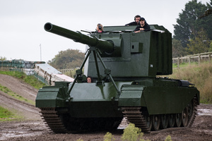 A running FV4005 Tank Destroyer seen during the showcase in the arena. The Tank Museum's Tiger Day is a biannually event at Bovington camp showcasing German Tiger 131, the only operational Tiger I tank in the world, it also features other World War II-era tanks including M4A2E8 Sherman "Fury", M3 Grant and the British Churchill tank. The event included a reenactment of the Battle of "Capture the Tiger", demonstrating how the Tiger 131 was captured on 24th April 1943 in Tunisia by 42nd Battalion Royal Armored Corps and 2nd Sherwood Foresters.