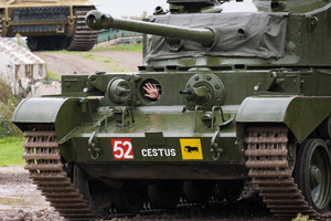 A tank driver waves during the showcase. The Tank Museum's Tiger Day is a biannually event at Bovington camp showcasing German Tiger 131, the only operational Tiger I tank in the world, it also features other World War II-era tanks including M4A2E8 Sherman "Fury", M3 Grant and the British Churchill tank. The event included a reenactment of the Battle of "Capture the Tiger", demonstrating how the Tiger 131 was captured on 24th April 1943 in Tunisia by 42nd Battalion Royal Armored Corps and 2nd Sherwood Foresters.