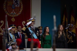 The Spanish Royal Family led by King Felipe VI (C) salute during the parade. During the Armed Forces parade on National Day led by King Felipe VI, Queen Letizia, their daughters Leonor de Borbón, Princess of Asturias and Infanta Sofía de Borbón.