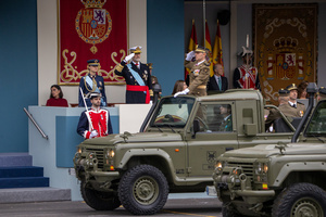 Army representatives march on armored vehicles seen during the parade. During the Armed Forces parade on National Day led by King Felipe VI, Queen Letizia, their daughters Leonor de Borbón, Princess of Asturias and Infanta Sofía de Borbón.