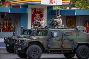 Army representatives march on armored vehicles seen during the parade. During the Armed Forces parade on National Day led by King Felipe VI, Queen Letizia, their daughters Leonor de Borbón, Princess of Asturias and Infanta Sofía de Borbón.