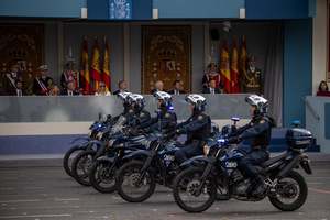 A group of National Police motorcyclists marches during the parade. During the Armed Forces parade on National Day led by King Felipe VI, Queen Letizia, their daughters Leonor de Borbón, Princess of Asturias and Infanta Sofía de Borbón.