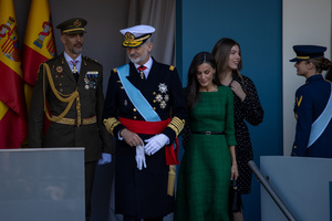 King Felipe VI and Queen Letizia attend the parade. During the Armed Forces parade on National Day led by King Felipe VI, Queen Letizia, their daughters Leonor de Borbón, Princess of Asturias and Infanta Sofía de Borbón.